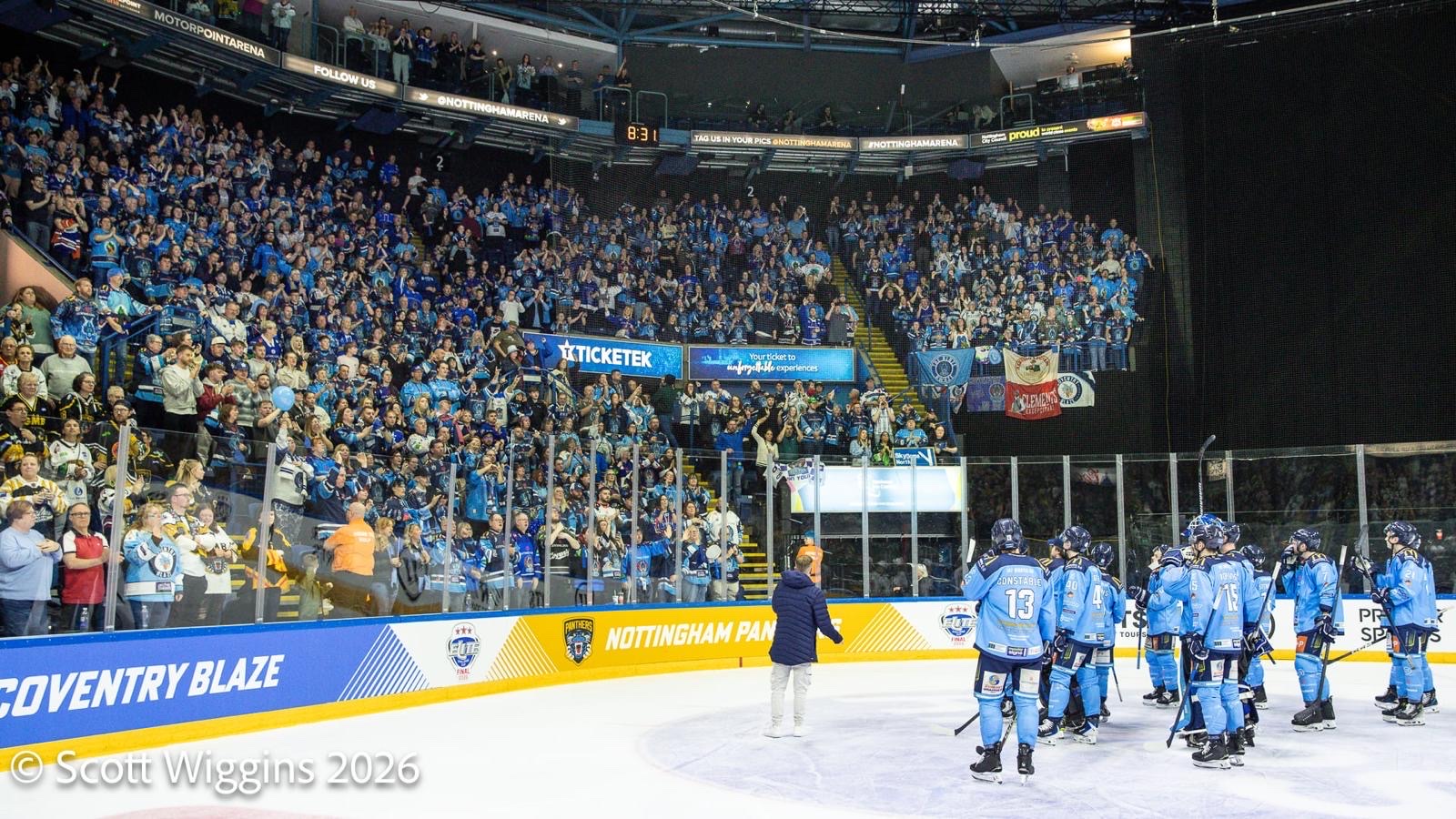 JD on the ice facing Coventry Blaze players and a packed Motorpoint Arena crowd